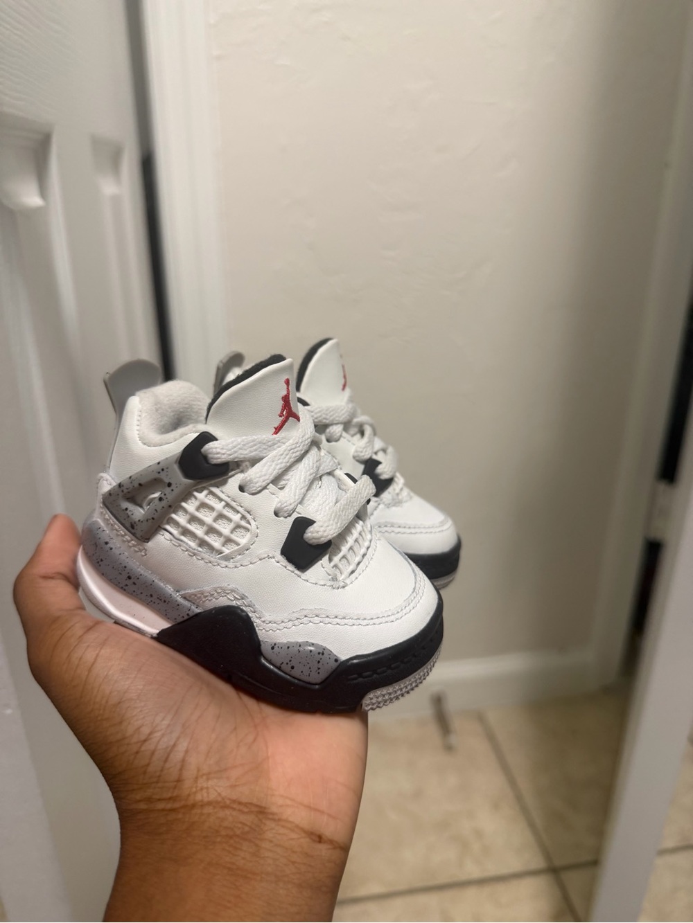 Kids White and Black Athletic Sneakers with Red Accent